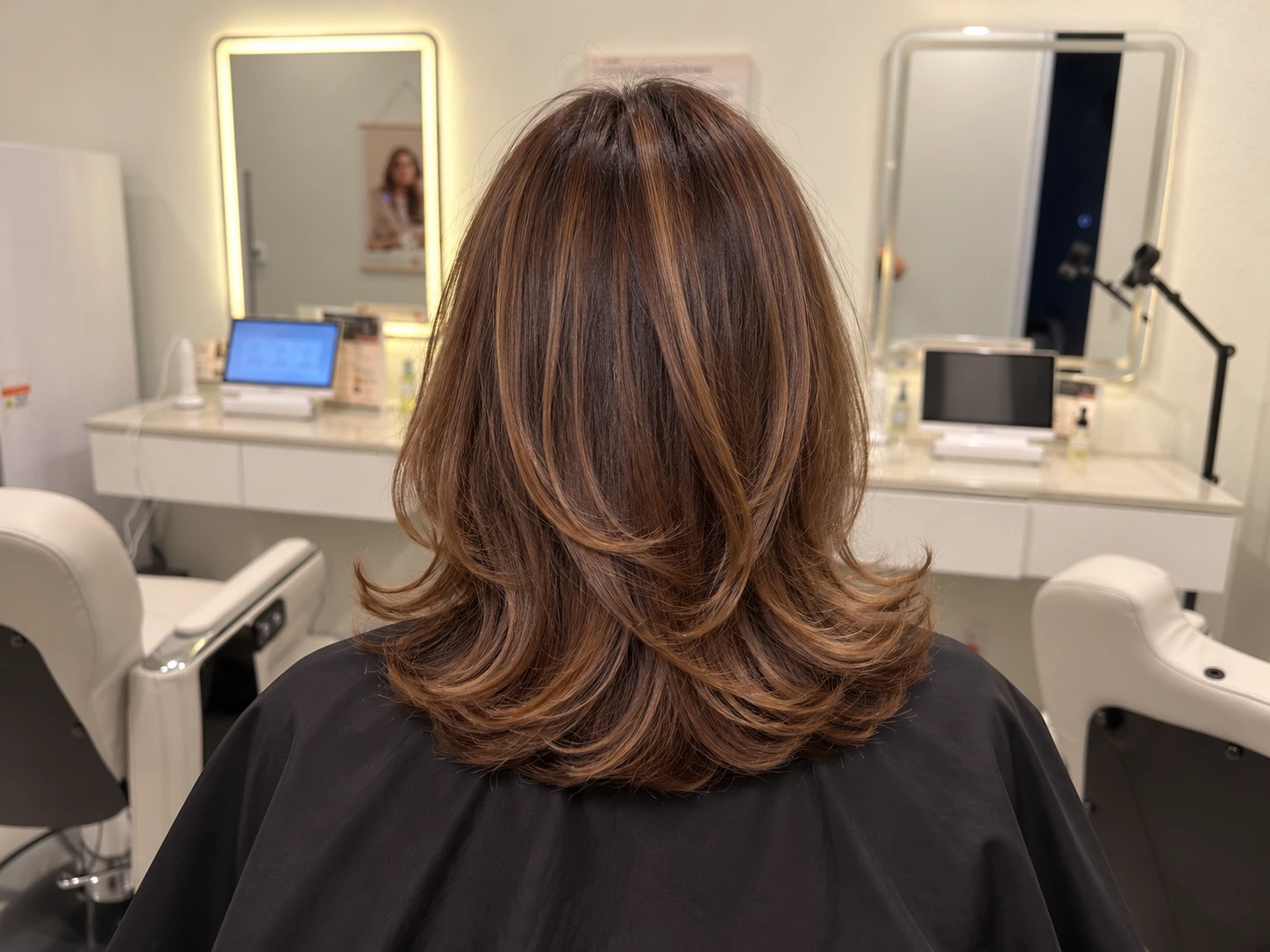Professional blowout result with smooth long hair